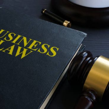Business law and gavel in a court.